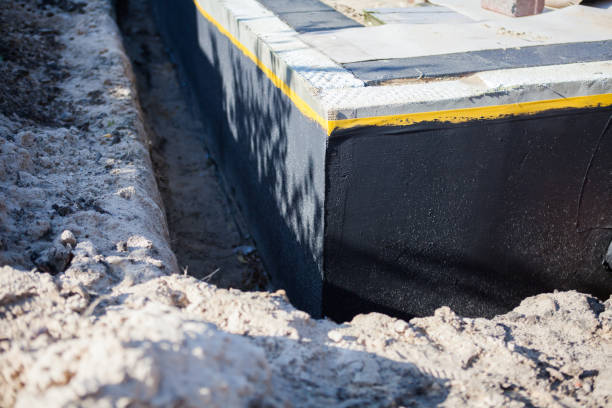 Professional Foundation Crack Repair technician working in Grass Lake, MI